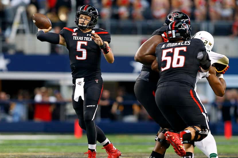 Texas Tech Red Raiders quarterback Patrick Mahomes (5) throws down field in the second...
