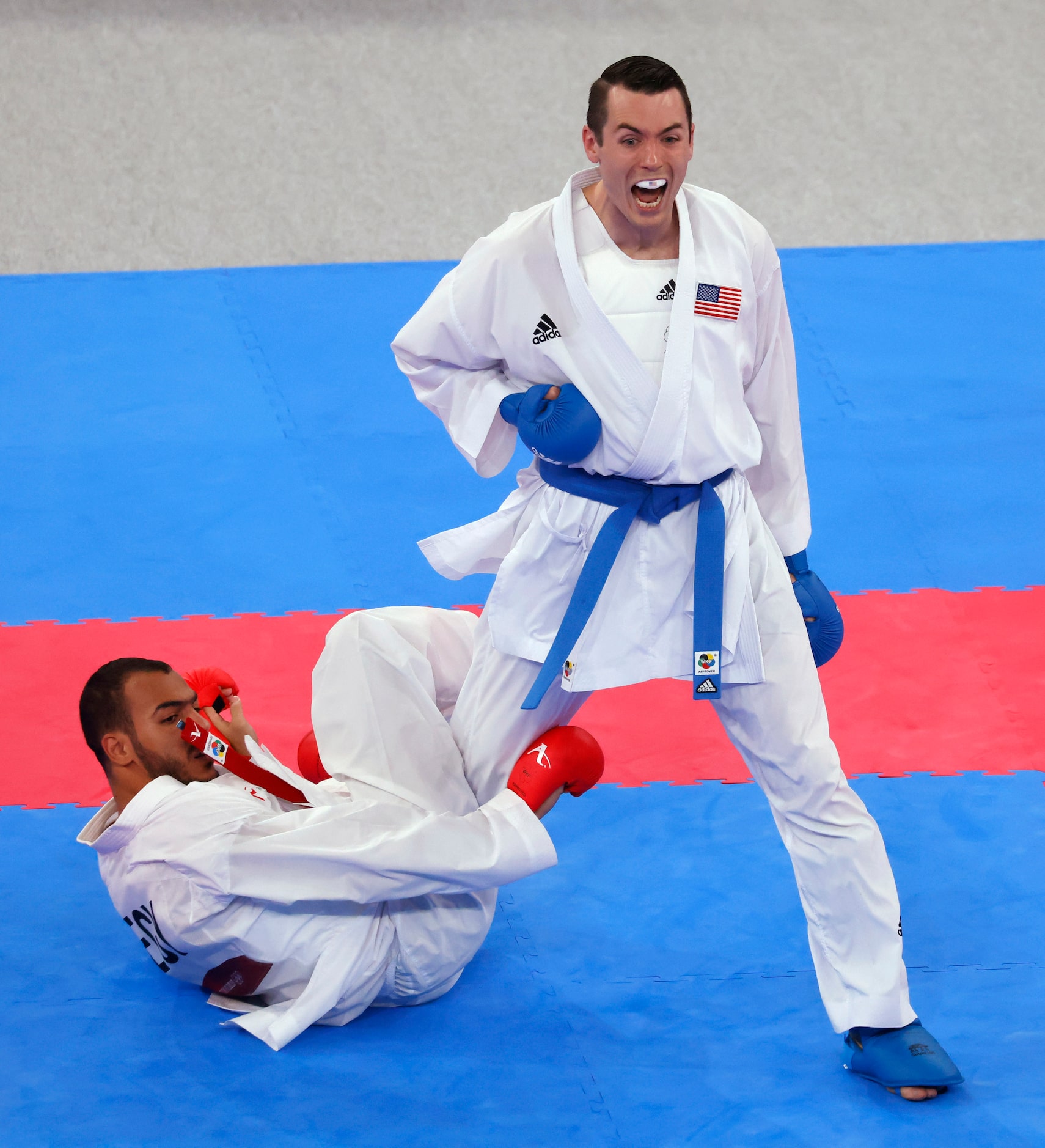 USA’s Tom Scott celebrates after scoring a point on Egypt’s Abdalla Abdelaziz during the...