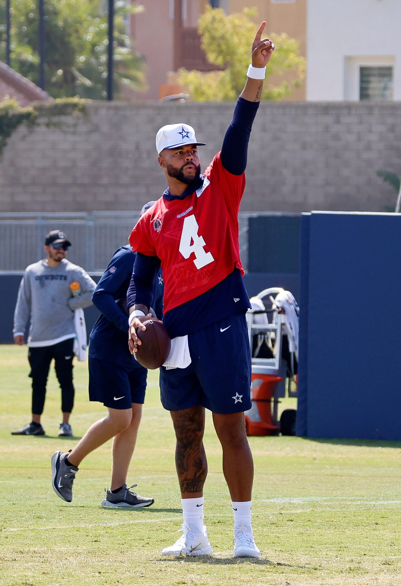 Dallas Cowboys quarterback Dak Prescott (4) points deep as he looked to throw during a mock...