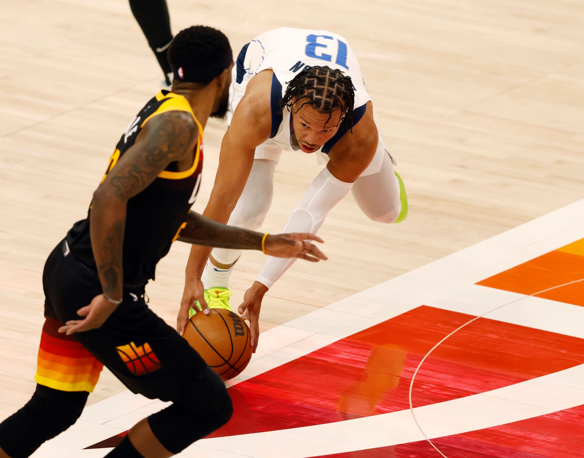 Dallas Mavericks guard Jalen Brunson (13) grabs the loose ball as Utah Jazz forward Royce...