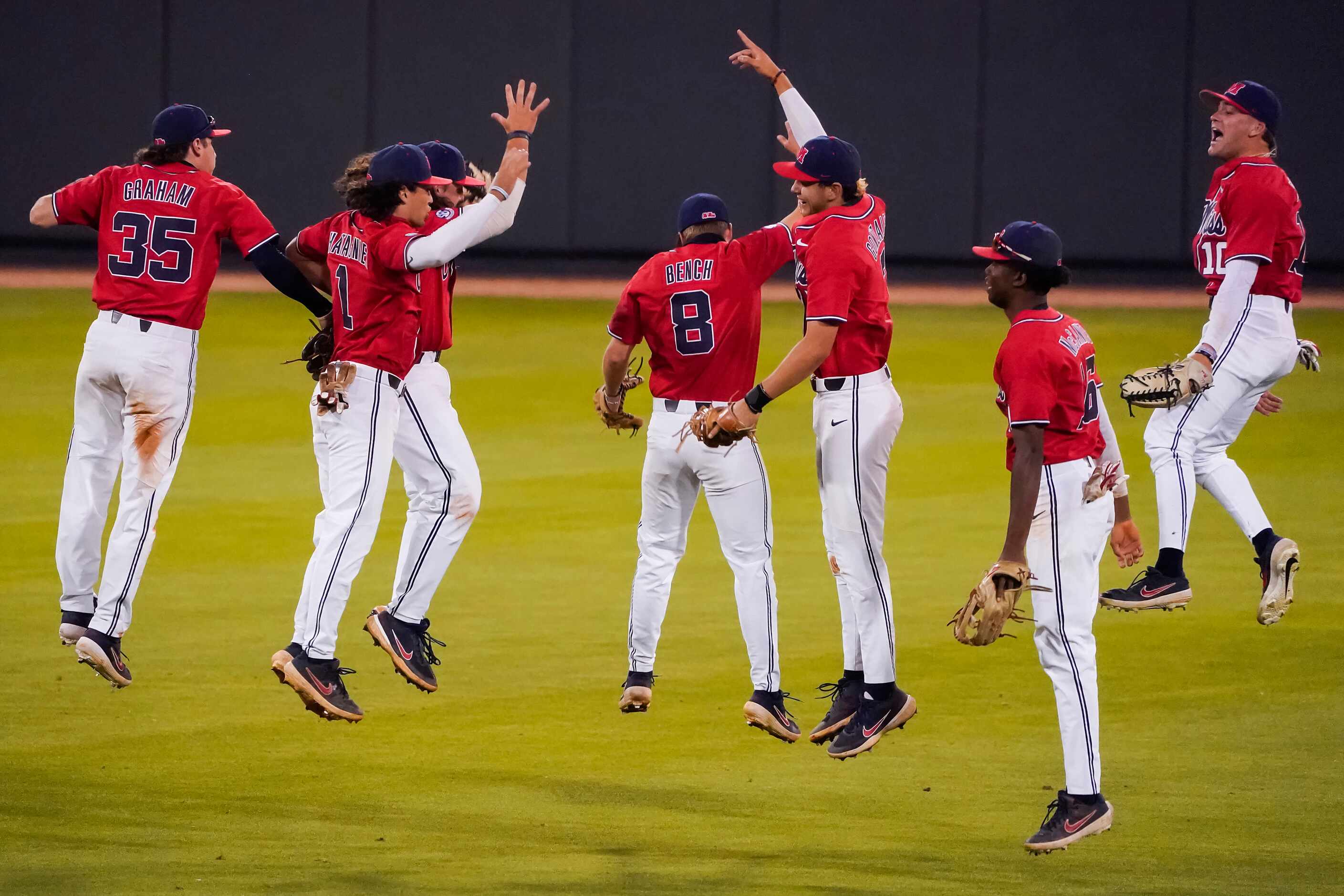Mississippi player celebrate after the final out of a 3-1 victory over Vanderbilt in an NCAA...
