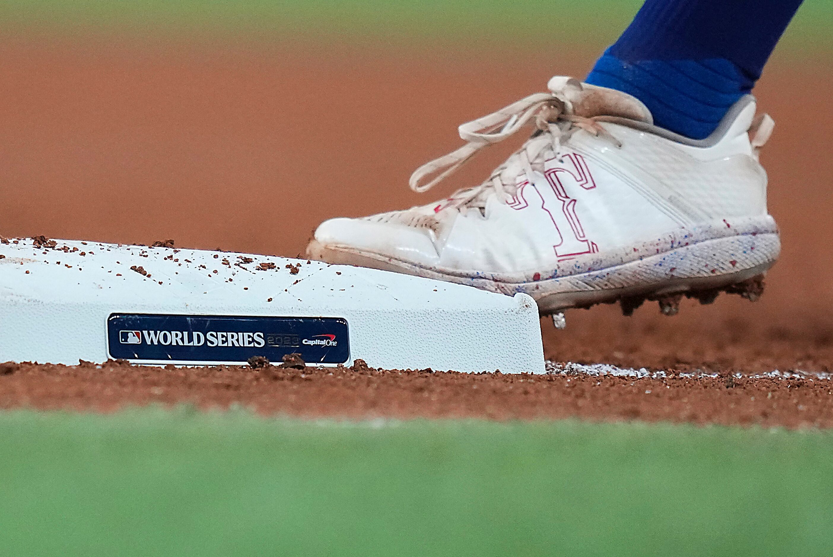 Texas Rangers third baseman Josh Jung stands on first base during the fifth inning in Game 2...