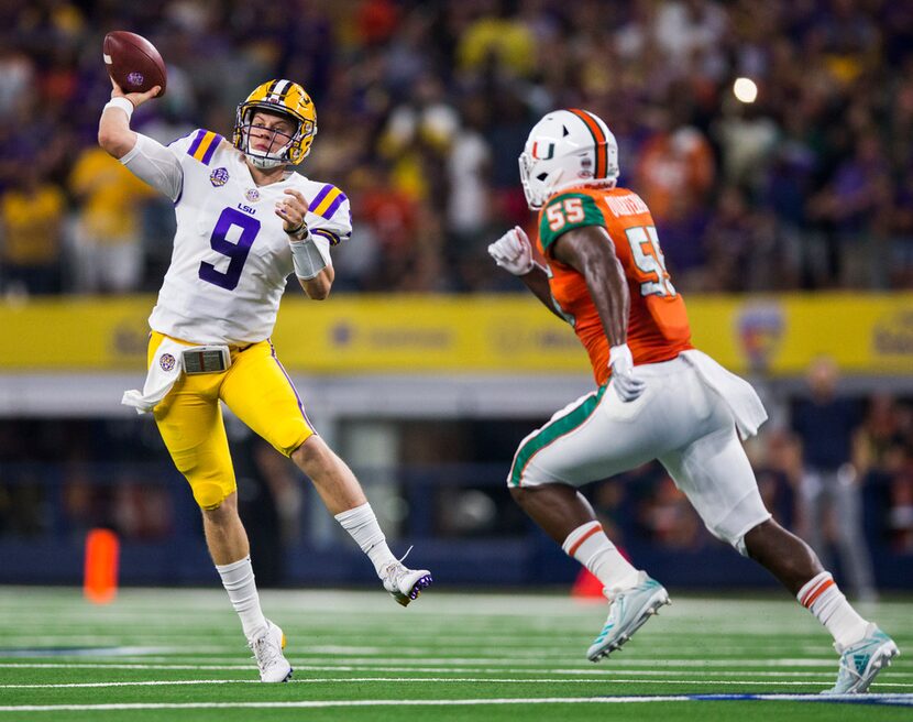 LSU Tigers quarterback Joe Burrow (9) throws a pass ahead of Miami Hurricanes linebacker...