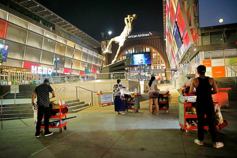 Mexican hot dog street vendors including Alexander Maldonado, left, and his brother Hector...