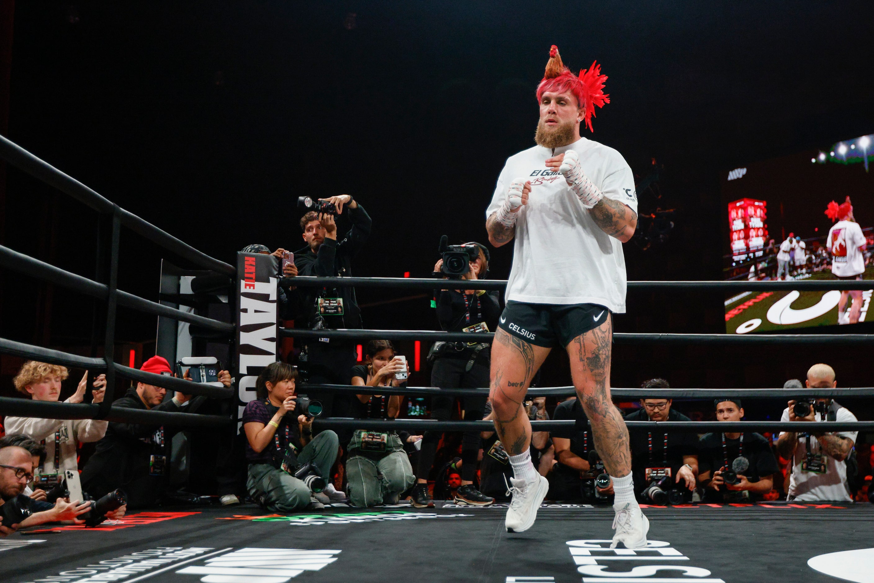 Jake Paul shadow boxes during an open workout ahead of his upcoming boxing bout against Mike...