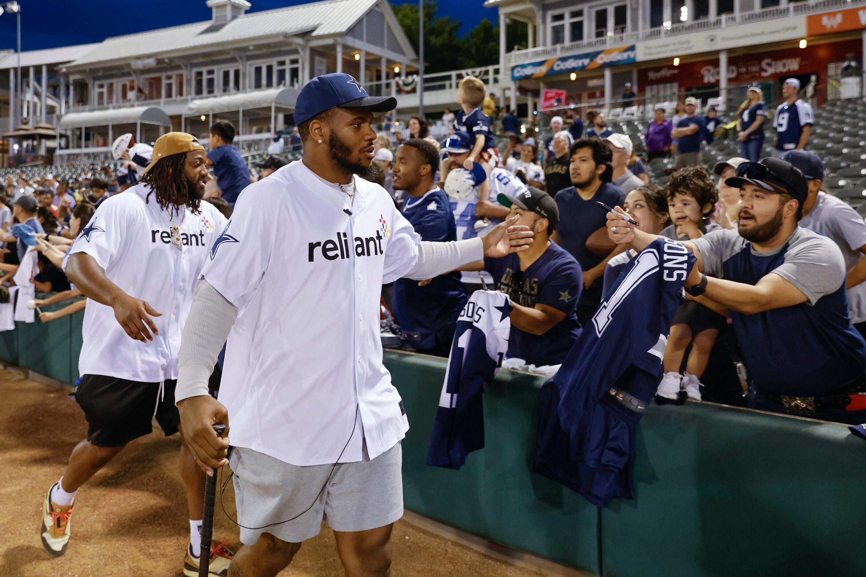 Dallas Cowboys linebacker Micah Parsons passes by the crowd after annual home run derby ...