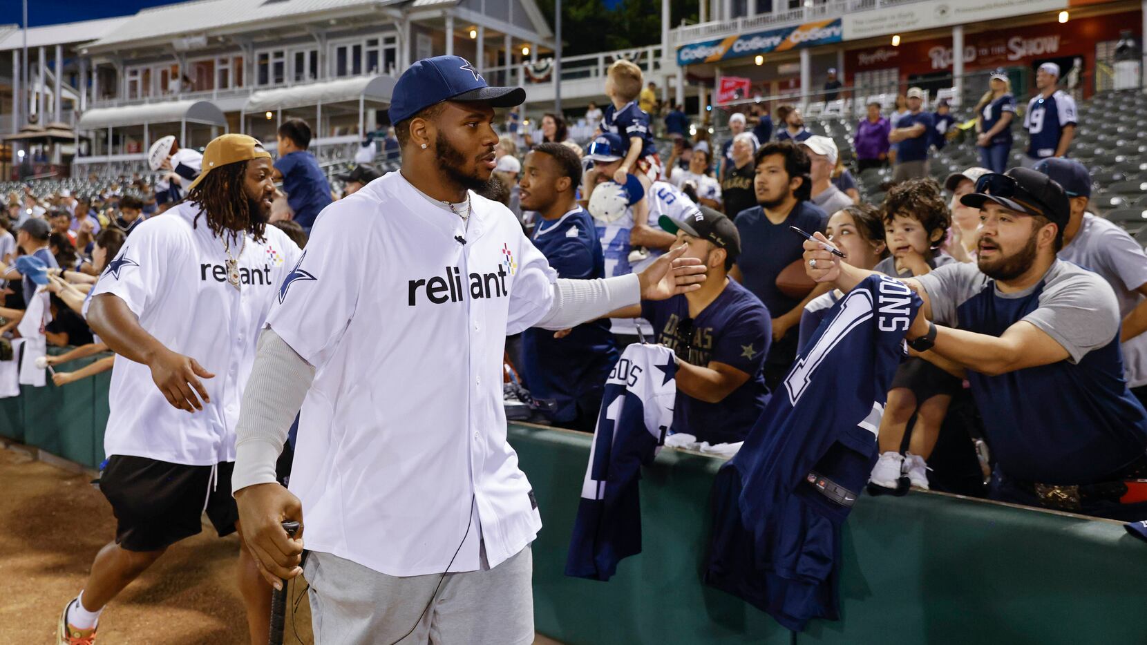 Dallas Cowboys linebacker Micah Parsons passes by the crowd after annual home run derby ...