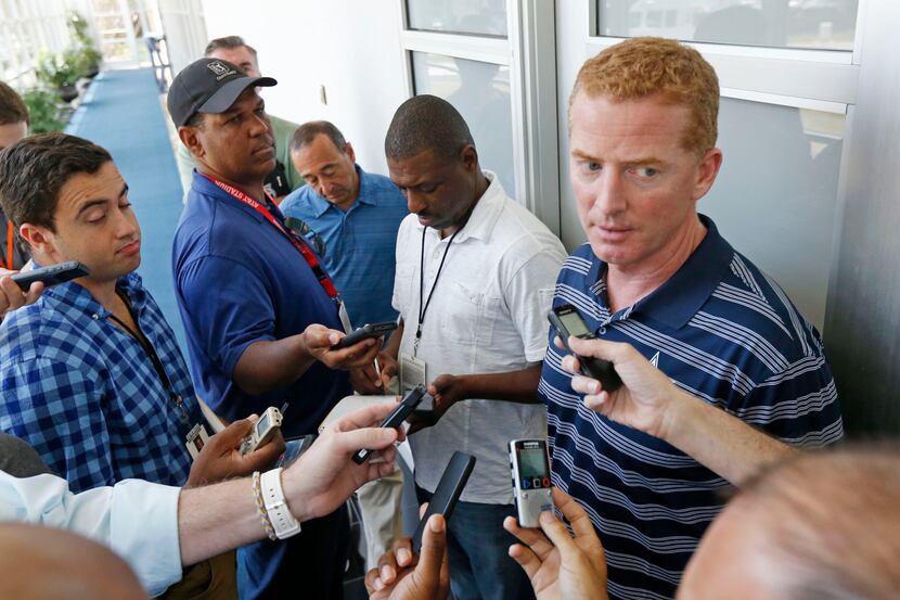 Dallas Cowboys coach Jason Garrett, talks to the media after a pre-draft press conference at...