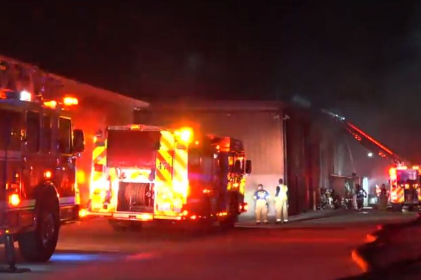 Firefighters battled a 3-alarm blaze that destroyed a cabinet factory Tuesday night in...