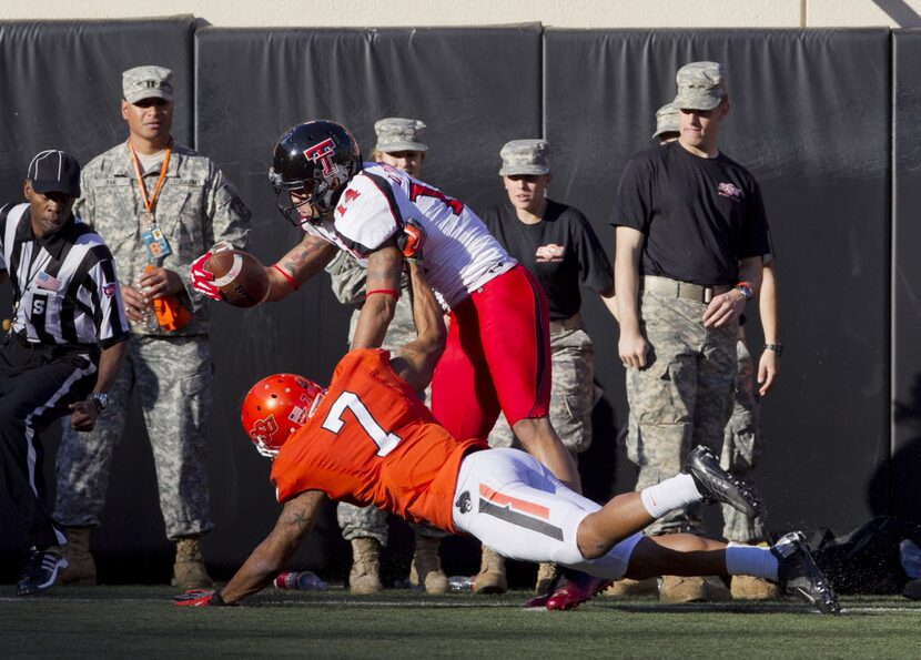 Nov 17, 2012; Stillwater OK, USA; Texas Tech Red Raiders wide receiver Darrin Moore (14)...