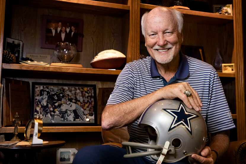 Former Dallas Cowboys great Cliff Harris poses for a portrait in the study of his home in...