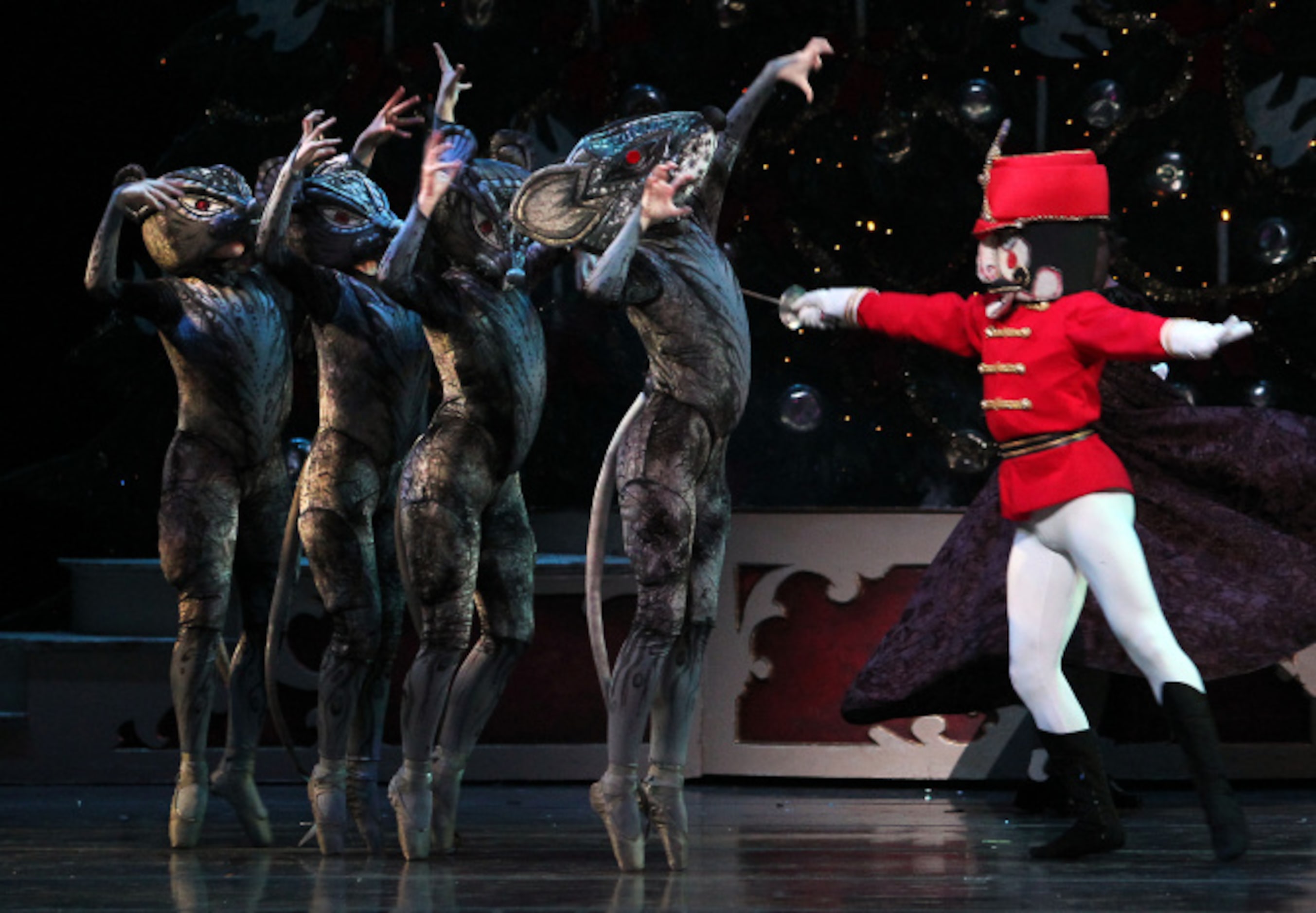 The Nutcraker played by Simon Wexler battles mice in Texas Ballet Theater's "The Nutcracker"...