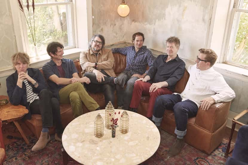 Jeff Tweedy, third from left, poses with members of the band Wilco.