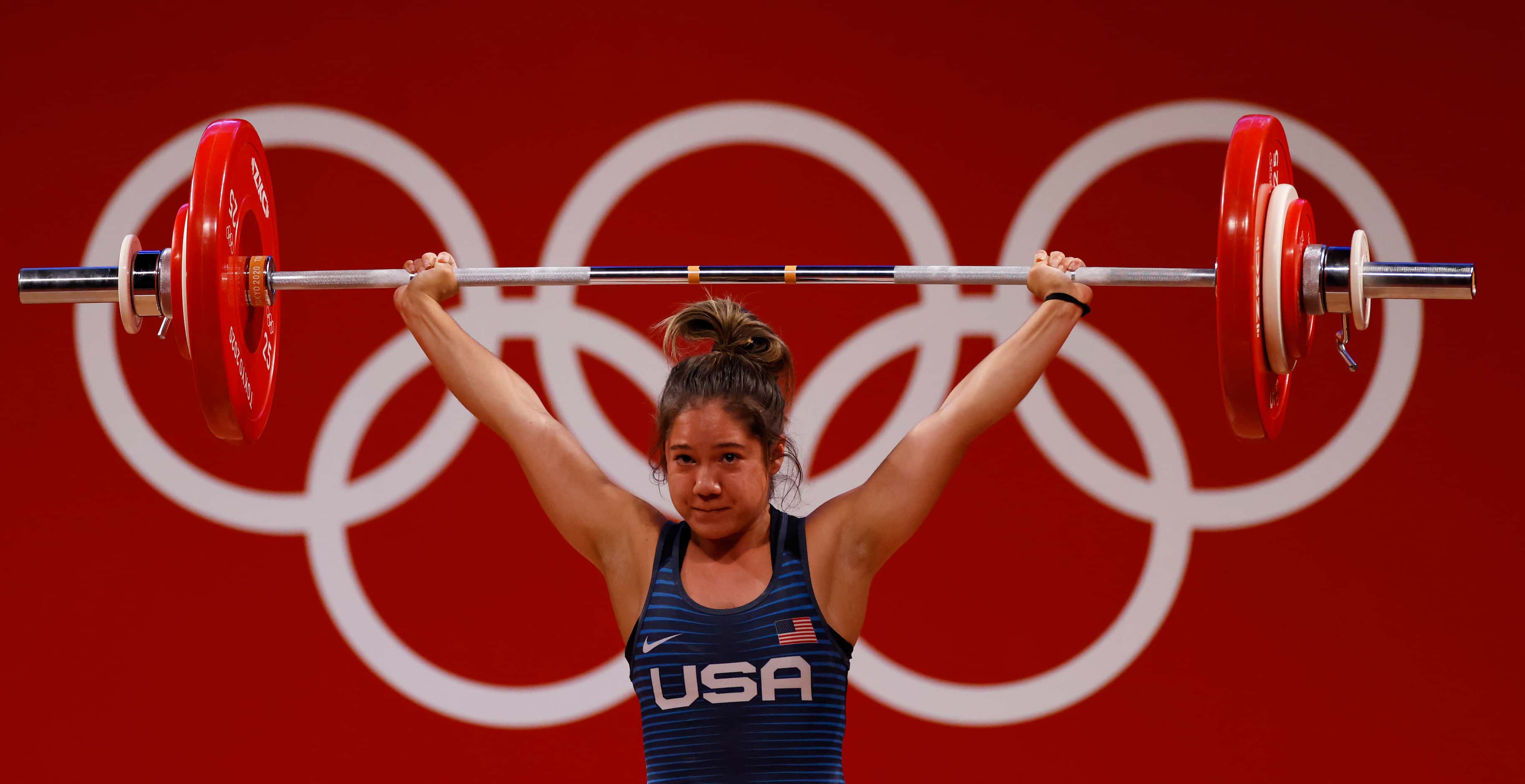 USA’s Jourdan Delacruz competes in the first attempt of the snatch round during the women’s...