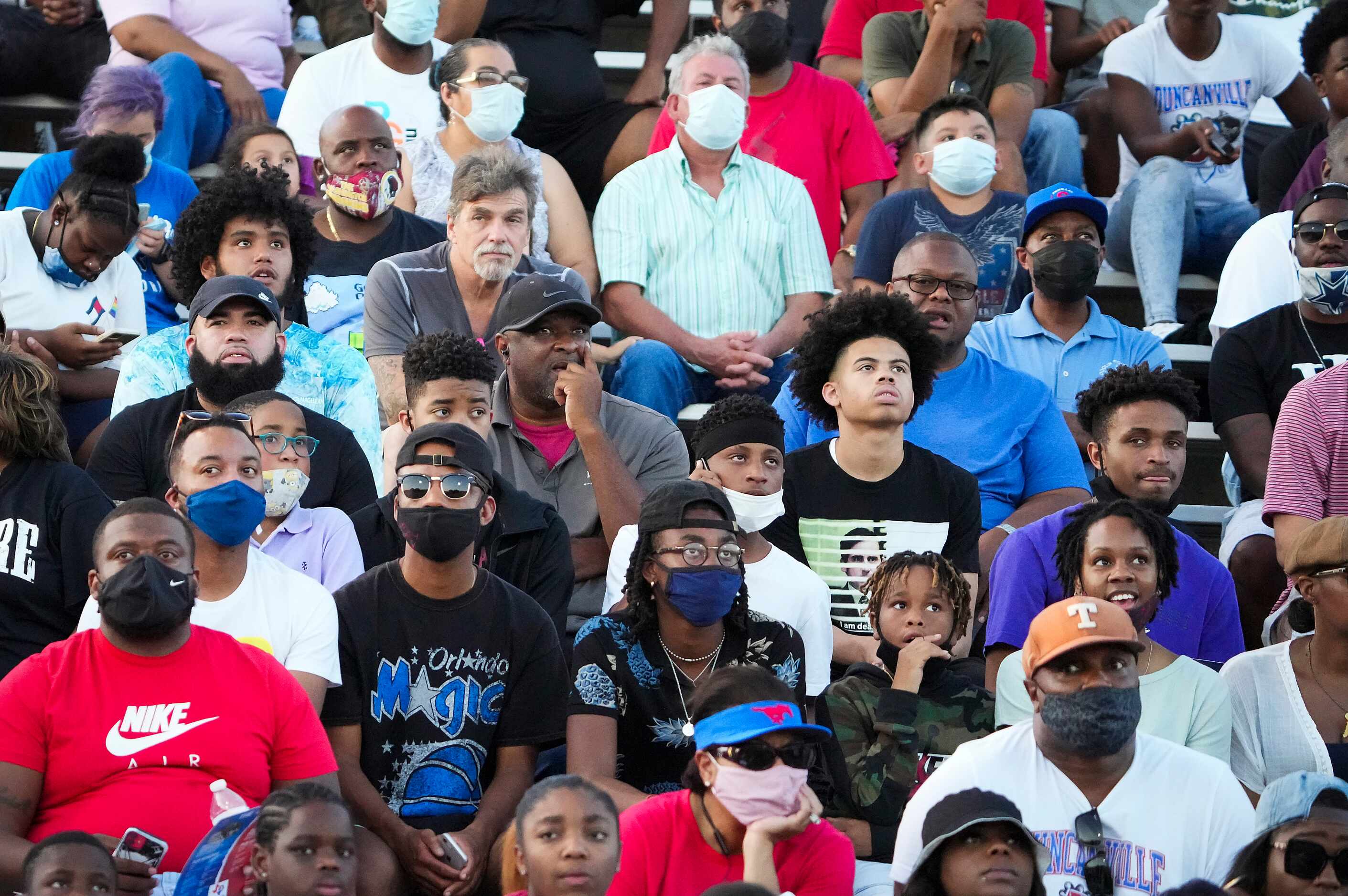 Duncanville fans watch during the first half of a high school football game against Mater...