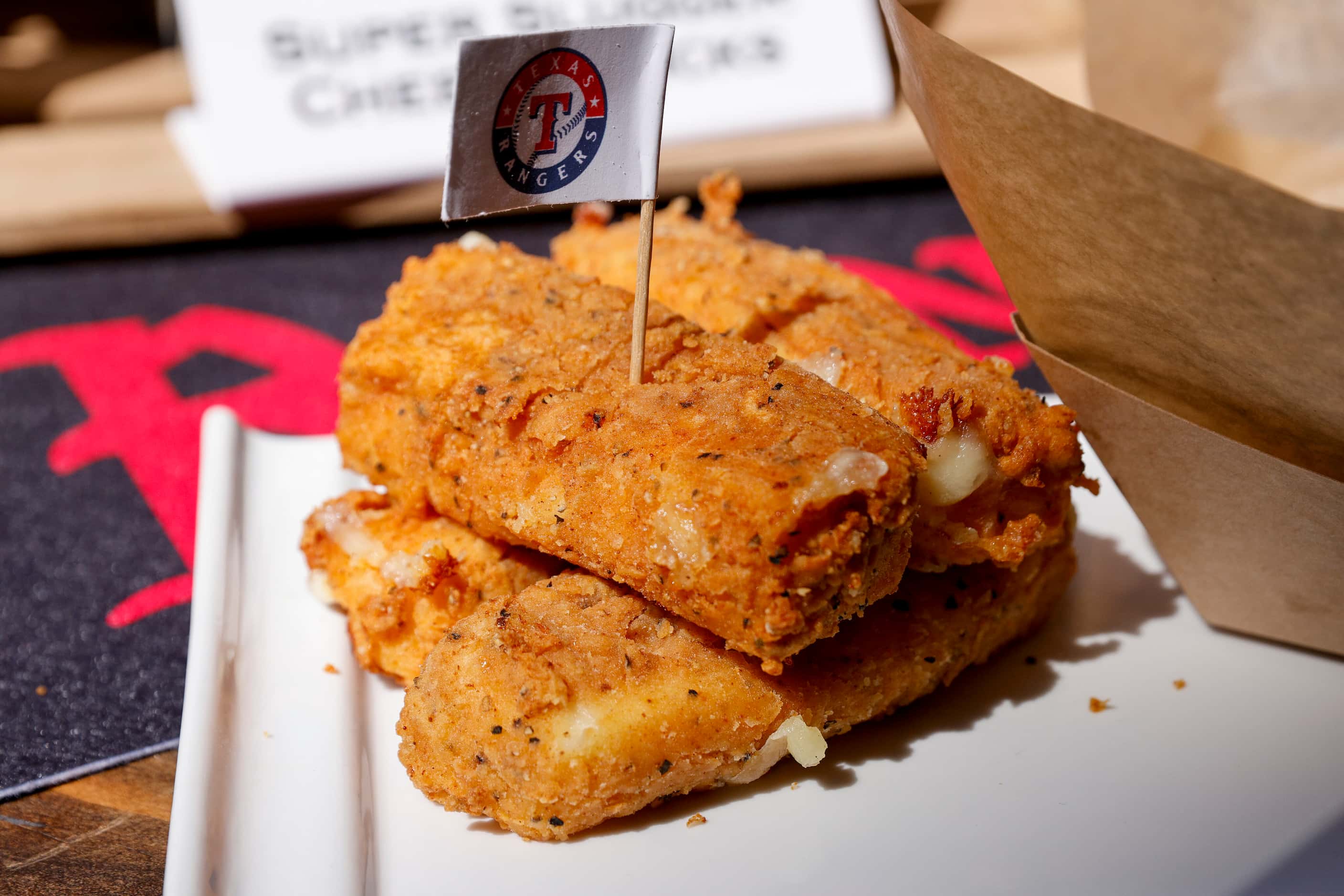 The Texas Rangers' new Super Slugger Cheese Sticks are giant — which concessions company...