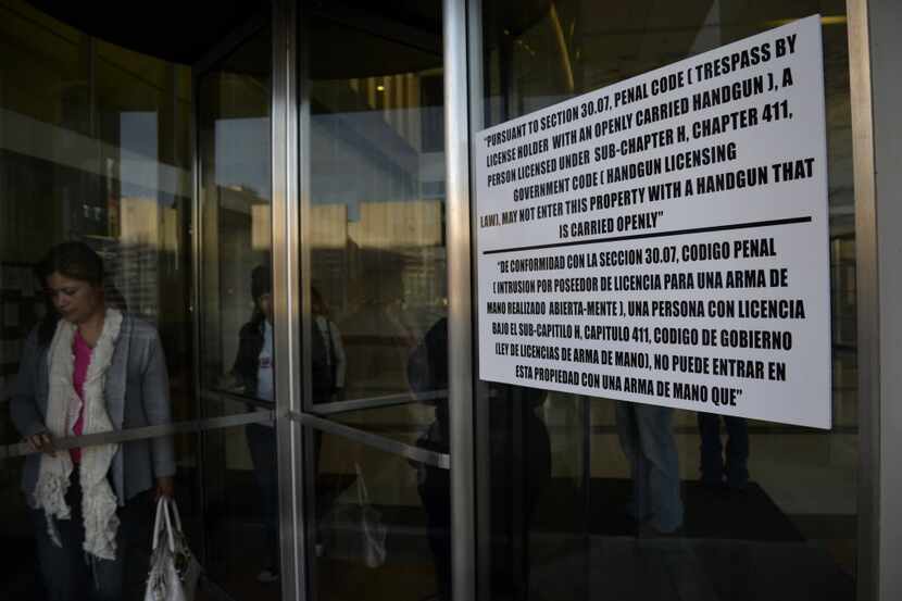 A sign at the Dallas County civil courts building prohibits the open carry of handguns.