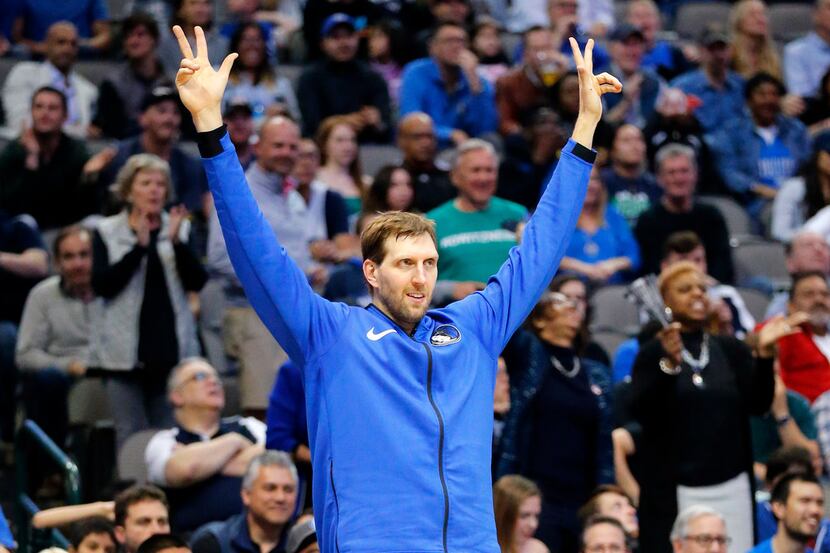 Dallas Mavericks forward Dirk Nowitzki (41) reacts after Luka Doncic hit the go-ahead...