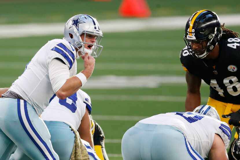 Dallas Cowboys quarterback Garrett Gilbert (3) communicates to his teammates from the line...