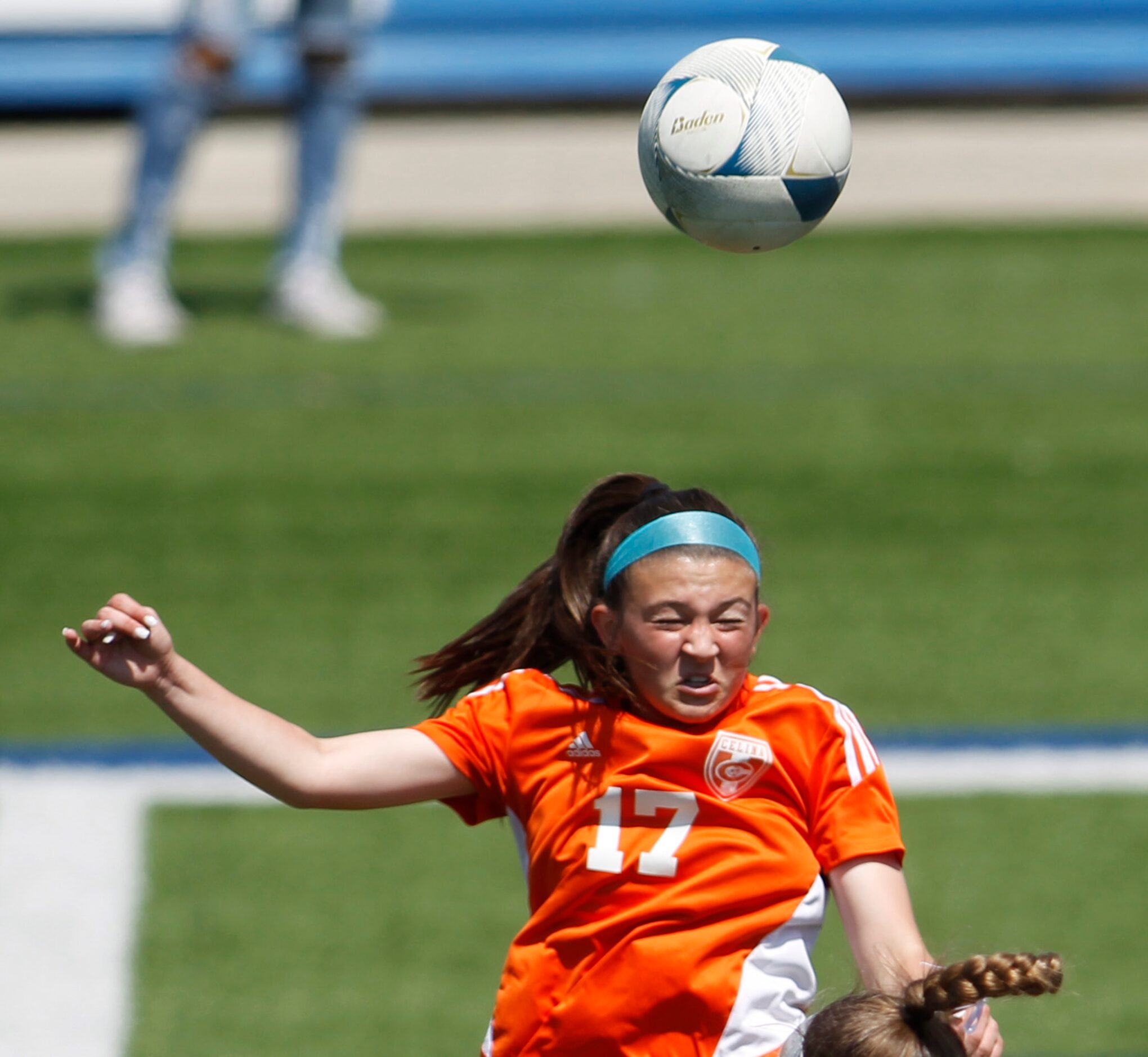 Celina's Brookelyn Babb (17) heads the ball to a teammate during first half action against...