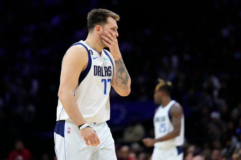 Dallas Mavericks' Luka Doncic reacts during the second half of an NBA basketball game...