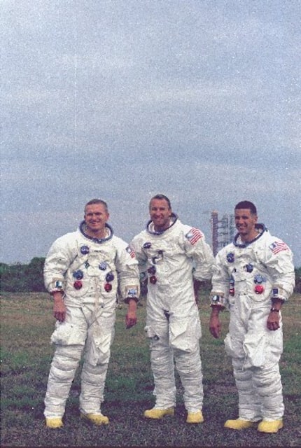  The Apollo 8 astronauts pose in front of the Saturn 5 Gantry at Cape Kennedy on Oct. 22,...