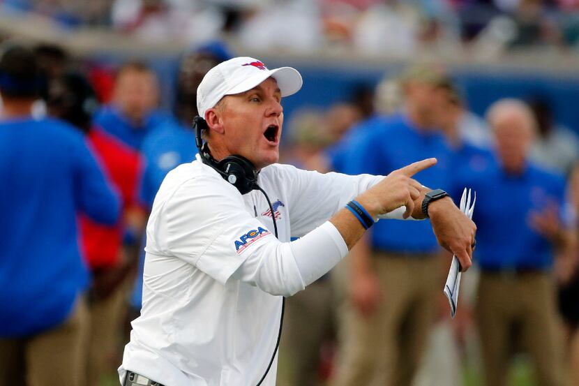 Southern Methodist head coach Chad Morris directs his team as they played Stephen F. Austin...