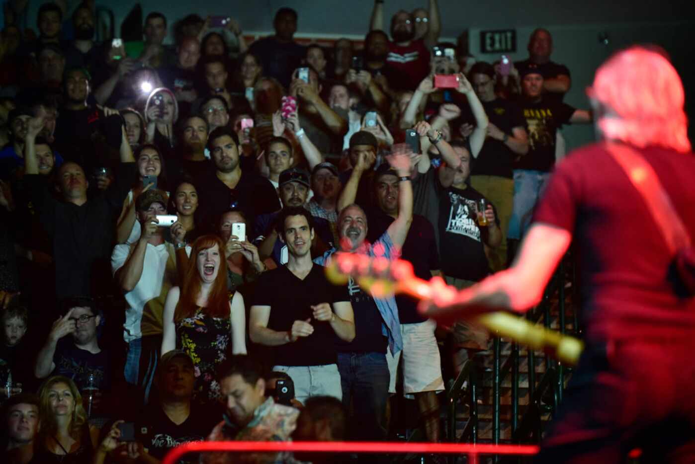 Fans react to Roger Waters as he performs Monday in concert for the Us + Them Tour at the...