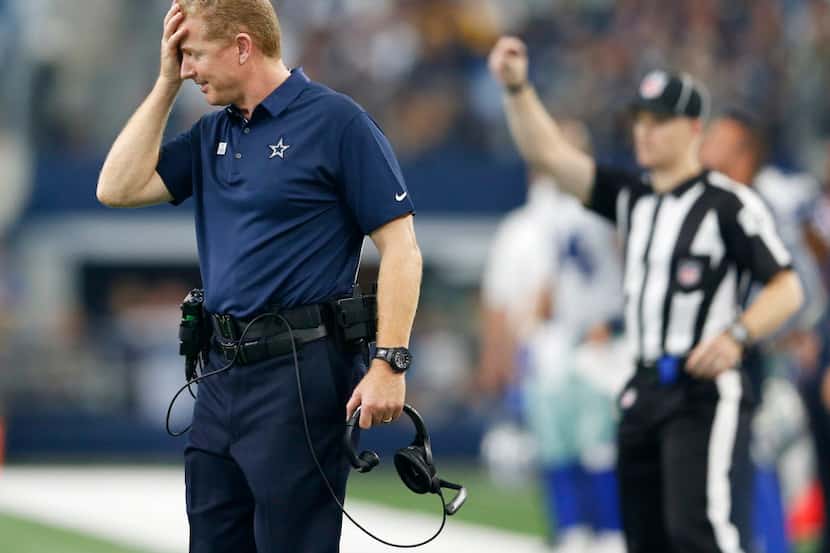 Dallas Cowboys head coach Jason Garrett reacts after a penalty was called for unnecessary...