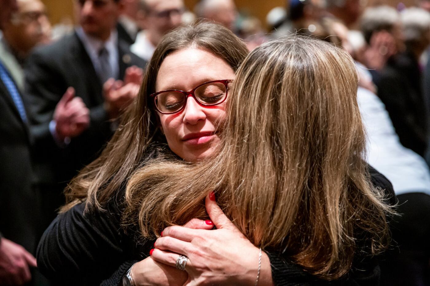 Rabbi Amy Ross, director of learning and innovation at Temple Emanu-el in Dallas, embraces...