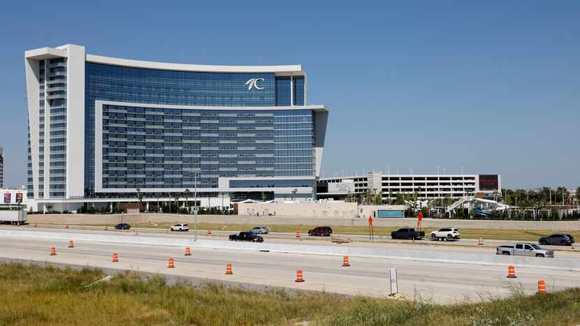 Cars drive along U.S. Route 69 past Choctaw Casino and Resort's Sky Tower, Thursday, Aug....