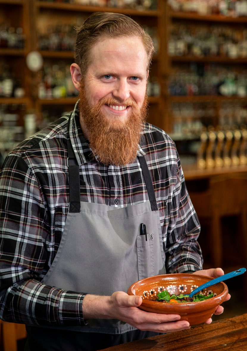 Executive Chef Matt Ford at Billy Can Can holds a Bowl of Red.