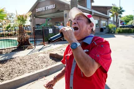Juan Hernandez sings karaoke in the parking lot of Fuel City. DJ Raul Ruvio has been hosting...