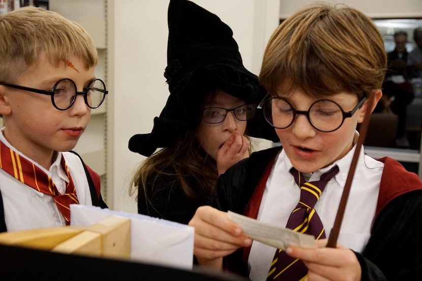 Jack Wilson (from left), Esther Fripp and Gabe Masino attended a previous Yule Ball, in...