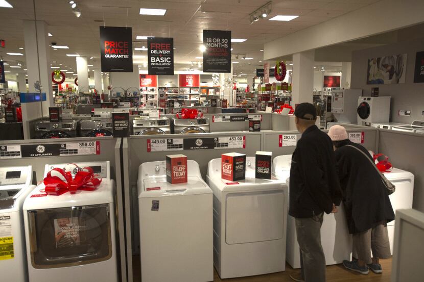 Shoppers browse appliances at the JC Penney Co. store inside the Roosevelt Field Mall in...