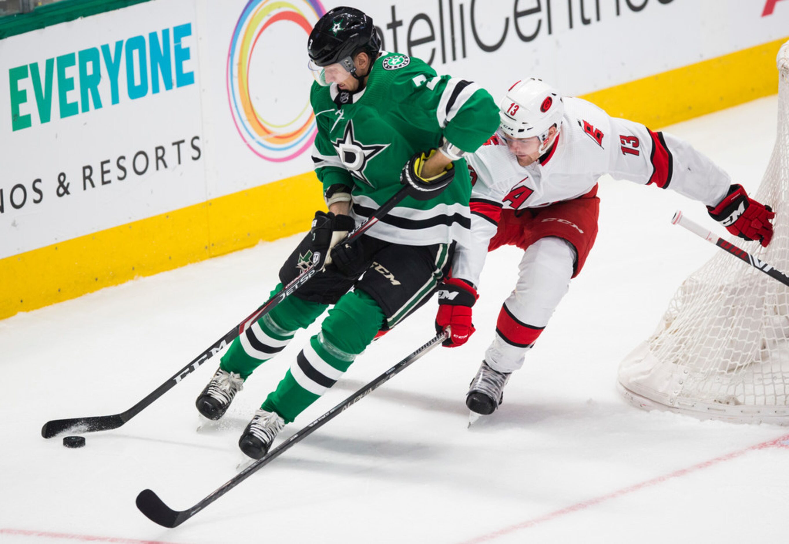 Dallas Stars defenseman John Klingberg (3) controls the puck with Carolina Hurricanes left...