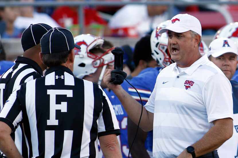 SMU head coach Sonny Dykes appears to disagree with a call made by game officials during...