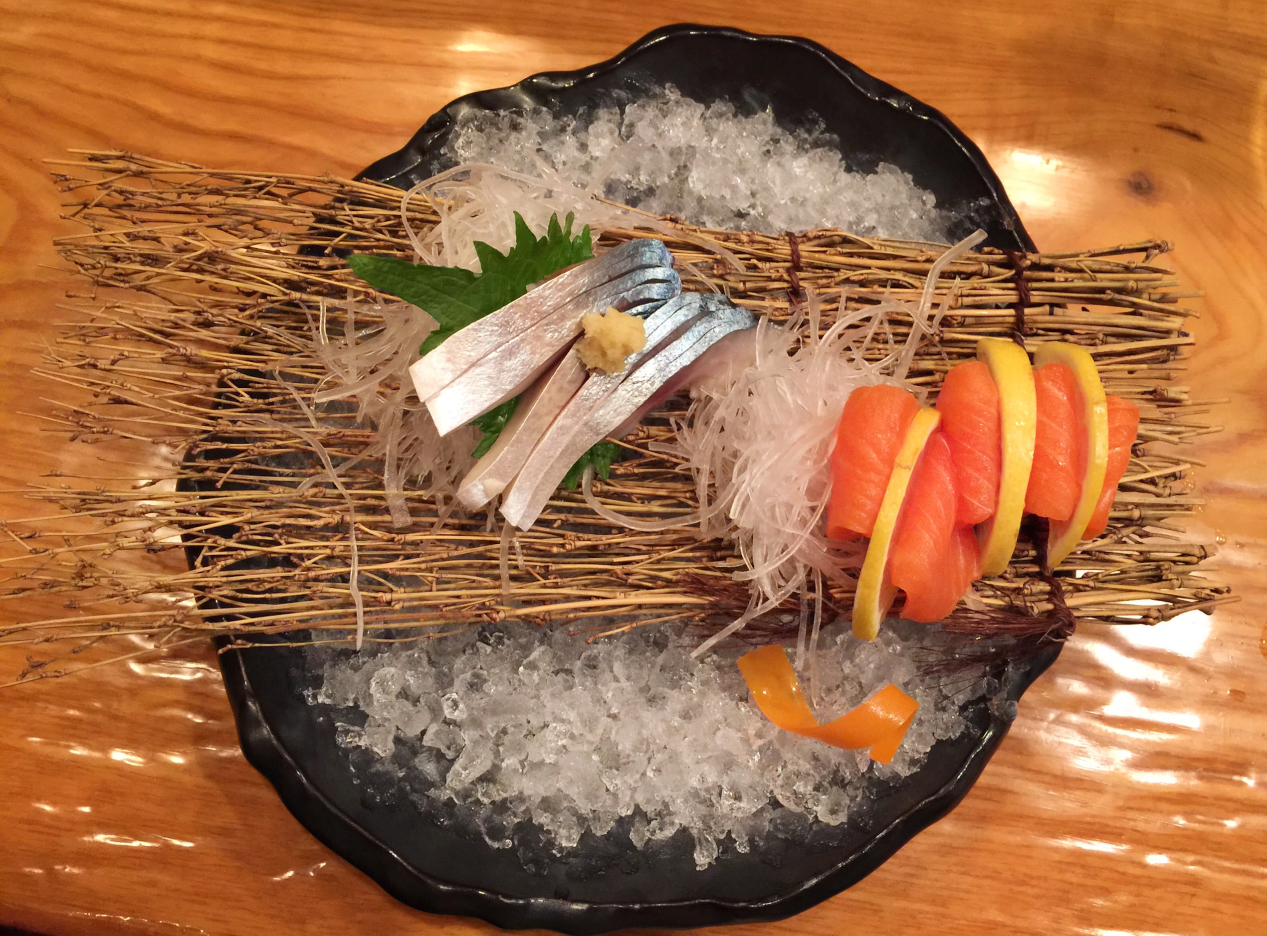 Sashimi from the "sushi tour of Japan" specials menu at Yutaka Sushi Bistro on Dec. 4, 2014....