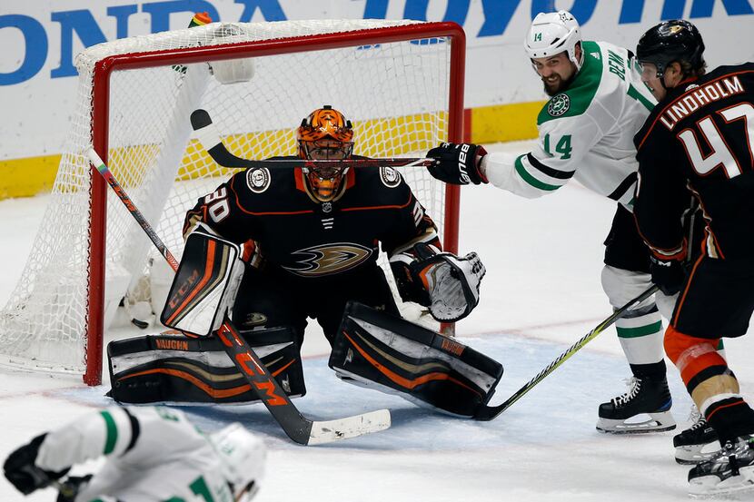 Dallas Stars defenseman Stephen Johns (28) shoots as Anaheim Ducks goaltender Ryan Miller...