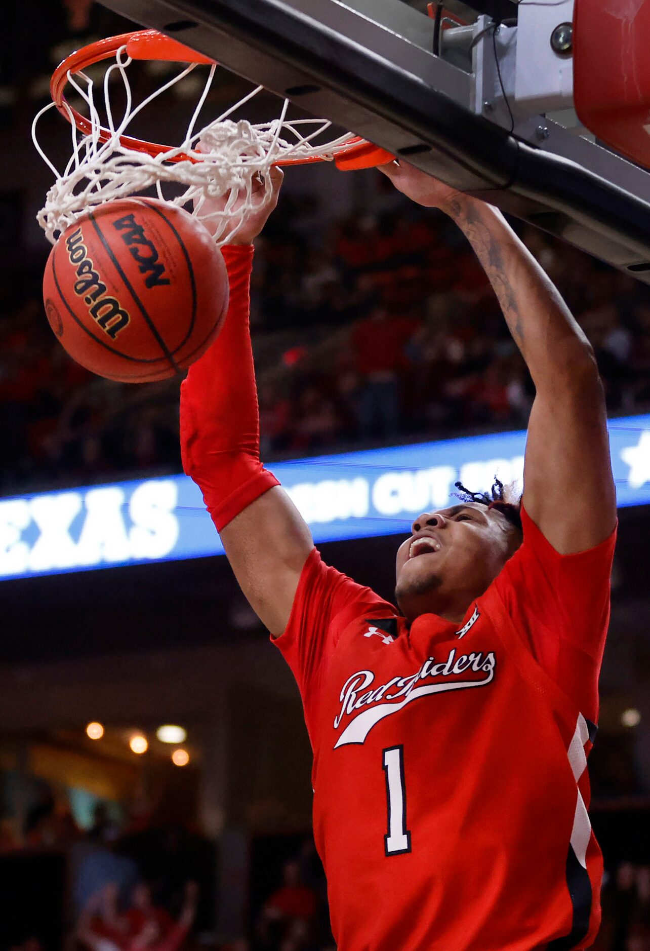 Texas Tech Red Raiders guard Terrence Shannon Jr. (1) completes the alley-oop dunk during...