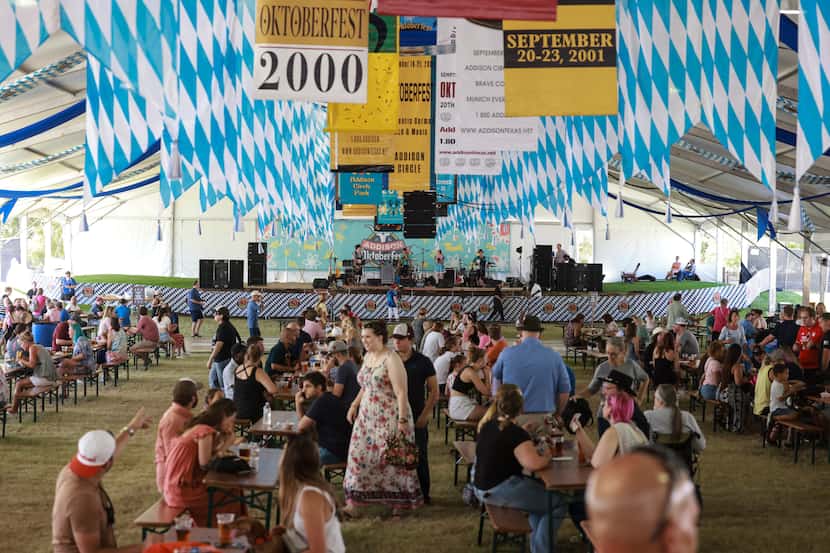 People gather for food, beer and music, Sunday, Sept. 18, 2022 at Addison Oktoberfest, in...