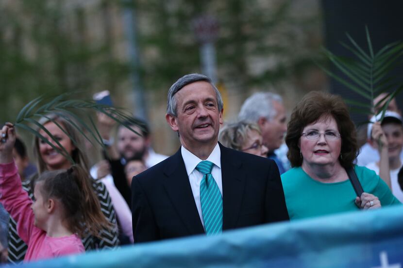 Pastor Robert Jeffress walks with his wife, Amy Jeffress, during the March for Eternal Life...