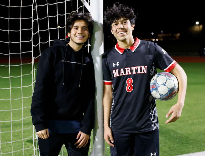 James Martin High School midfielder Joel Romero (right) poses for a photo with his cousin...