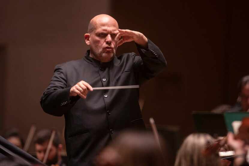 Dallas Symphony Orchestra conductor laureate Jaap van Zweden leads the orchestra in his...