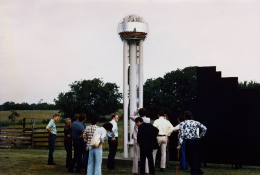 Ray Hunt (in sunglasses) and John Scovell (in plaid pants) had a 16-foot model of Reunion...