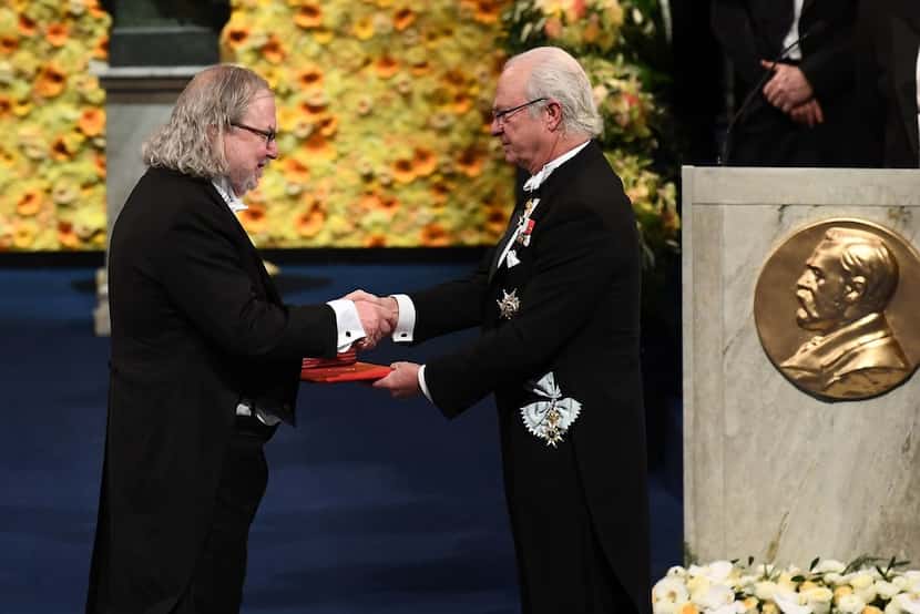 Immunologist James Allison, left, received his Nobel Prize from King Carl XVI Gustaf of...