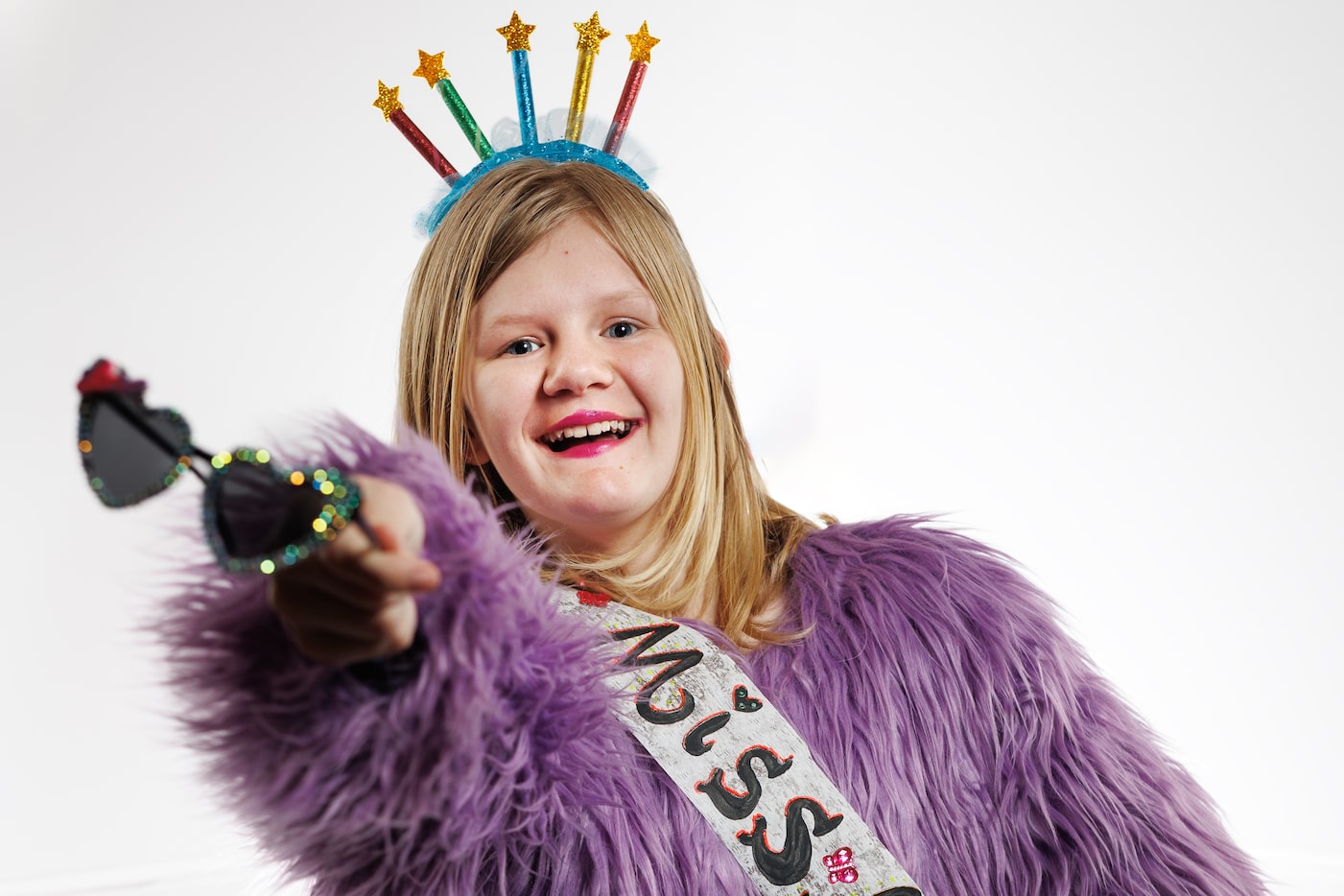 Keely Vawter, 12, poses for a portrait during the Taylor Swift Celebration Dance Party at...