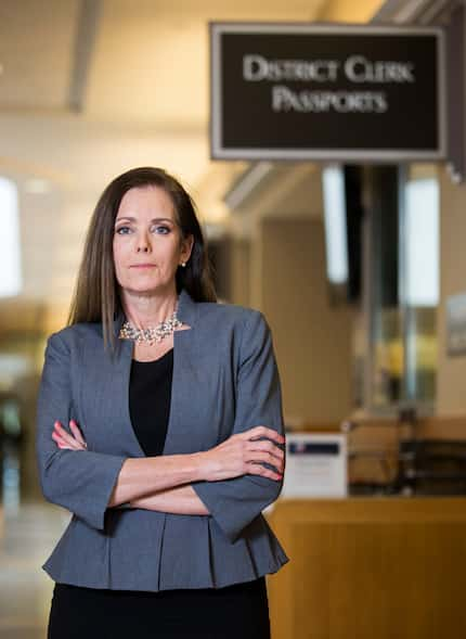 District Clerk Lynne Finley poses for a portrait outside the Collin County passport office,...