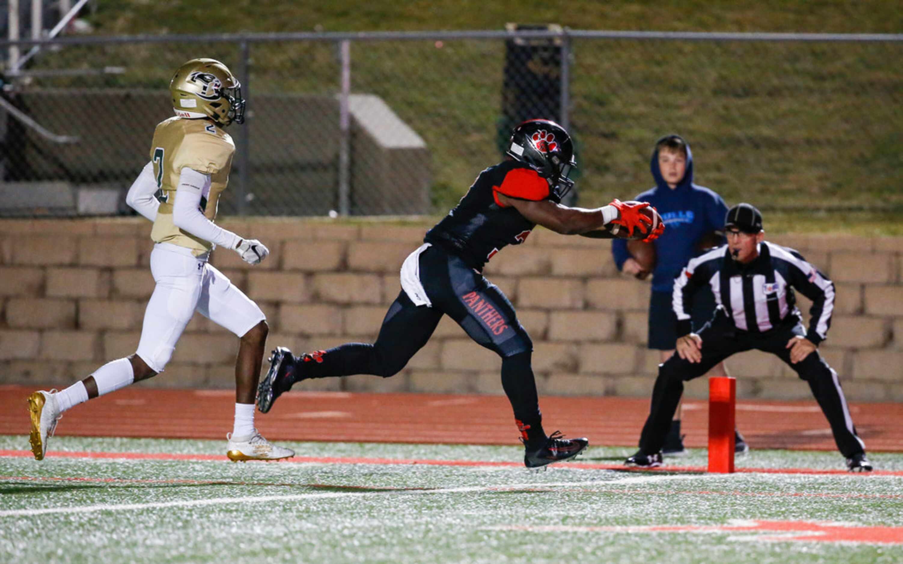 Colleyville Heritage wide receiver Isaac Shabay (3) receives a pass over Birdville defensive...