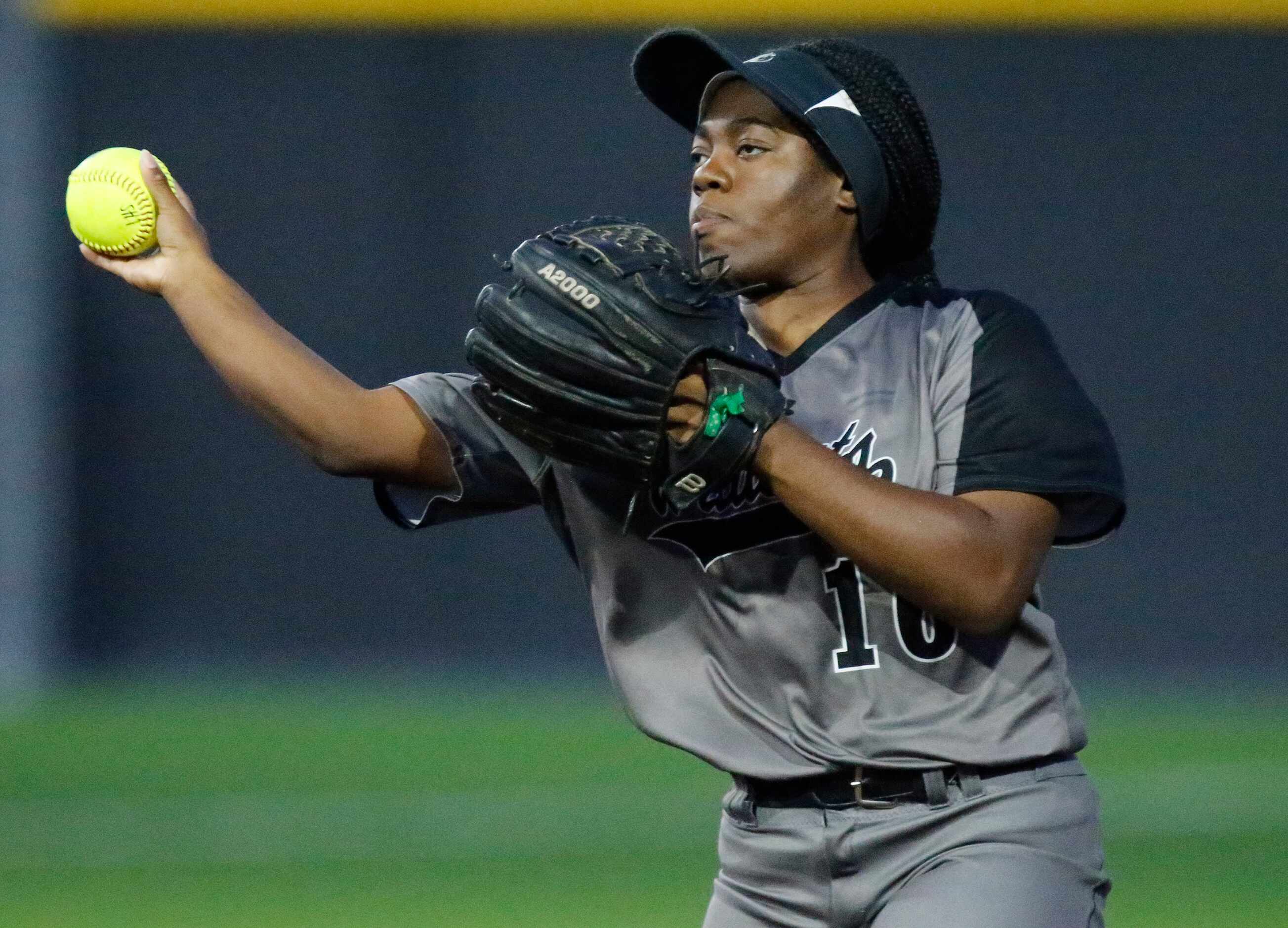 Denton Guyer High School second baseman Bre Jackson (16) throws for an out in the second...